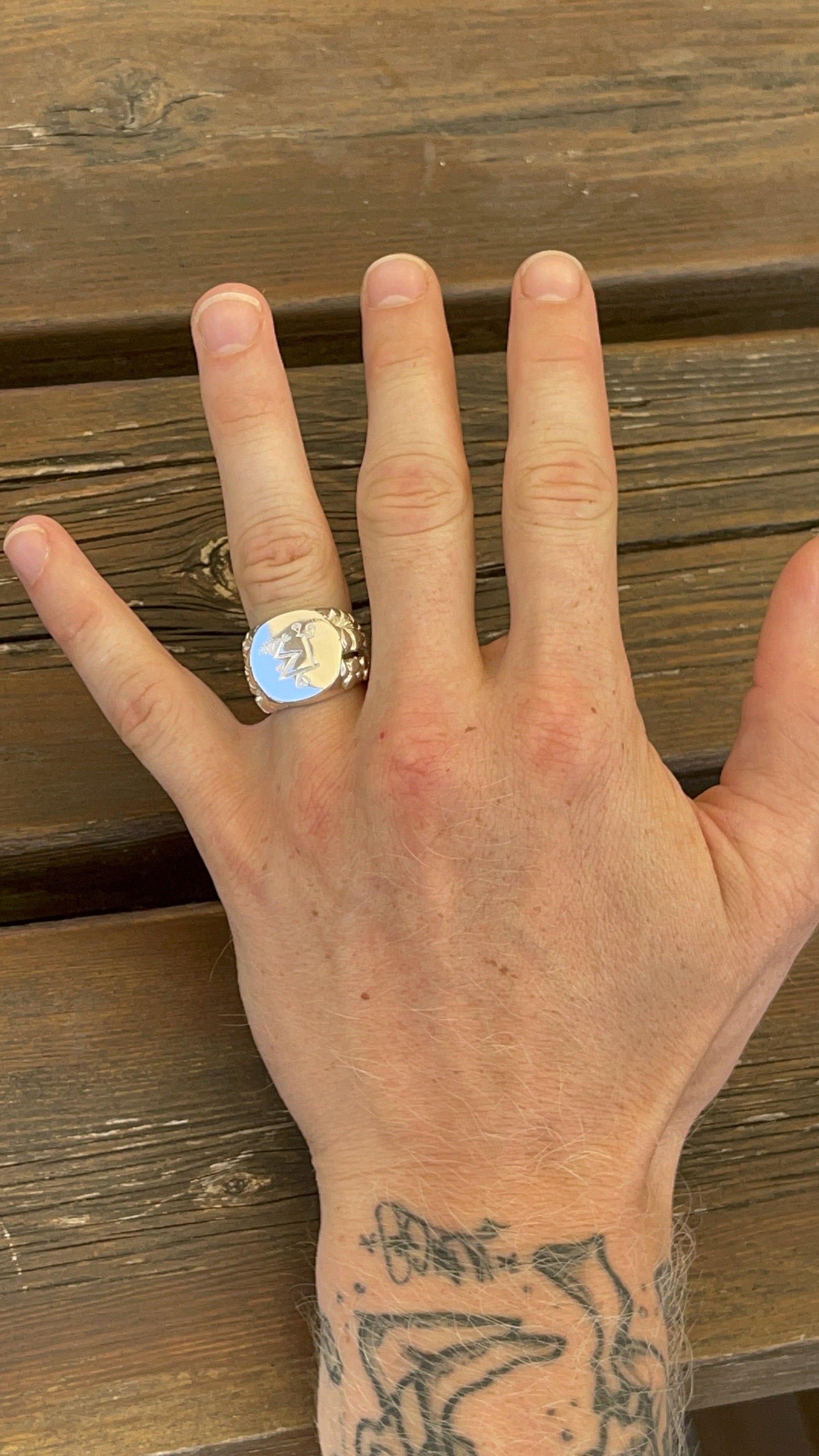 Kairo's finished bespoke wedding ring worn on his hand